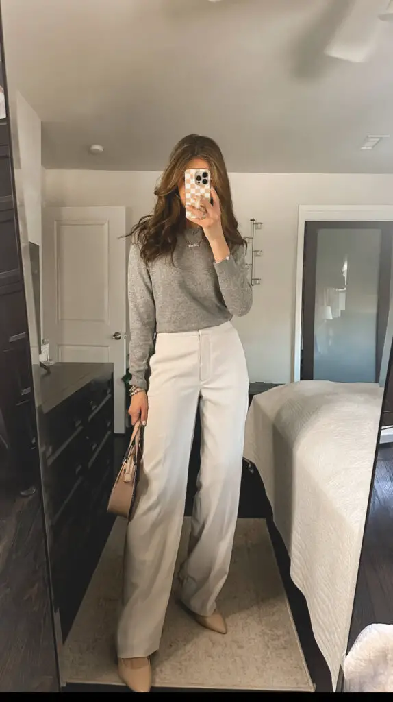 gray quince cashmere sweater with beige trousers