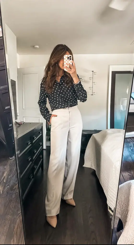 polka dot blouse and cream trousers outfit