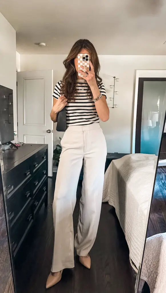 cream trousers outfit with striped top